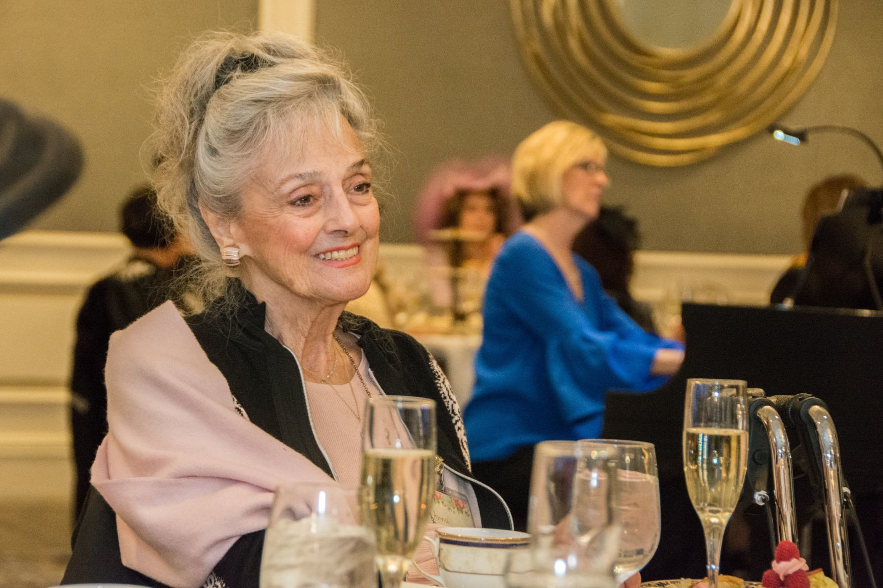 A guest watches the opera performance at Royal Tea with Winter Opera